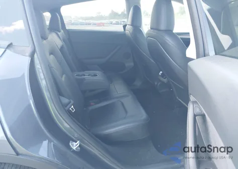 2023 Tesla Model Y Awd/Long Range Dual Motor All-Wheel Drive z USA, uszkodzony, nr VIN 7SAYGDEE2PF752100